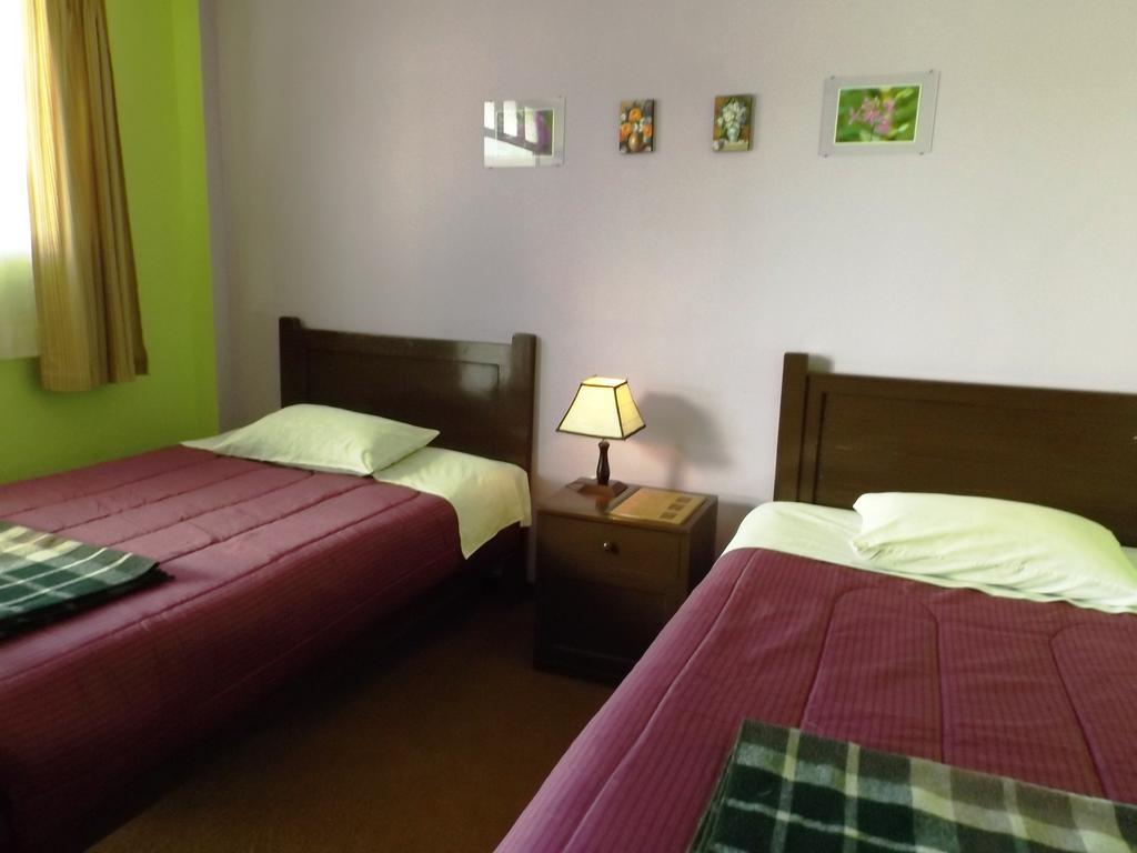El Manzano Guest House Puno Værelse billede